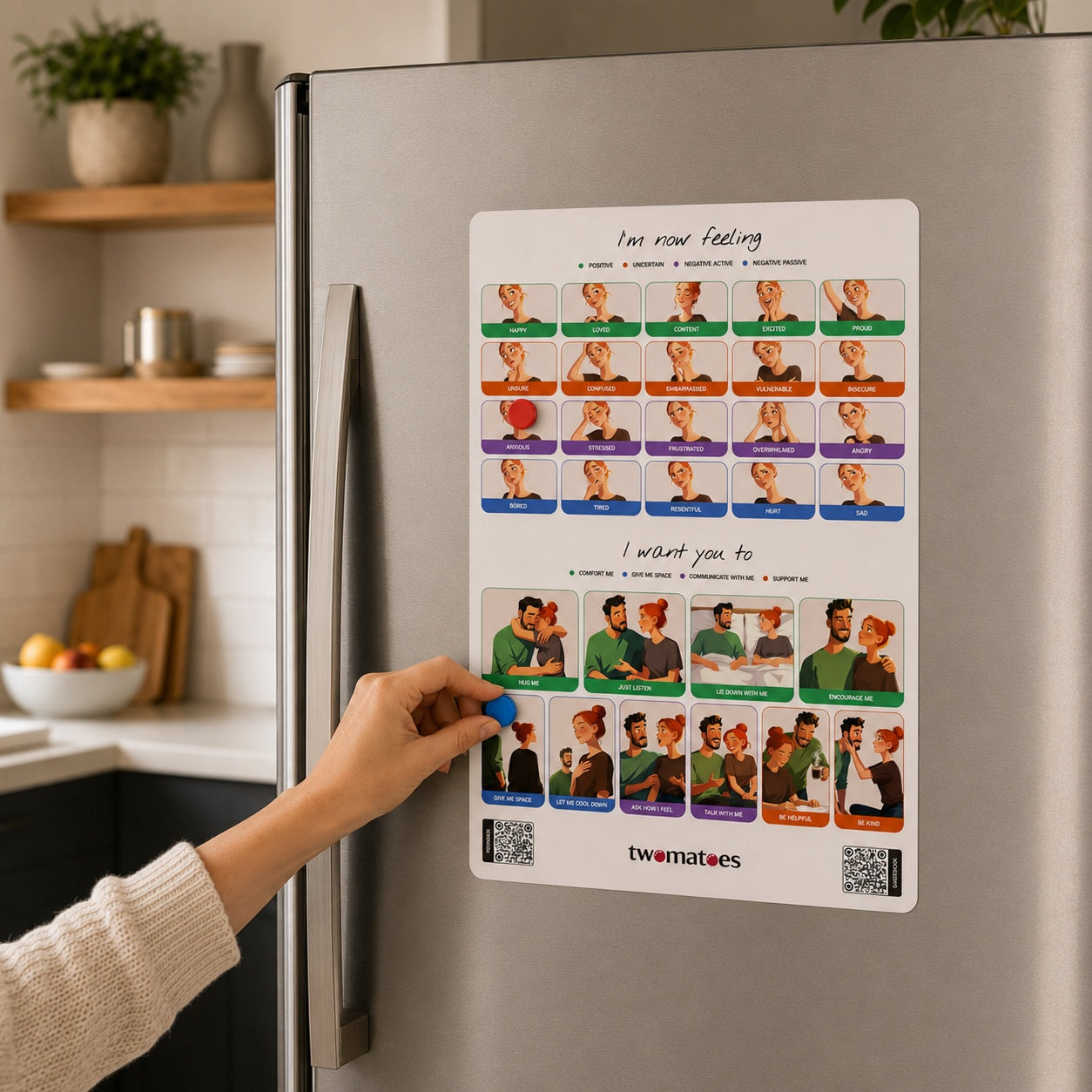 Woman placing a blue magnet on the Twomatoes Emotion Board to show what response she wants from her partner